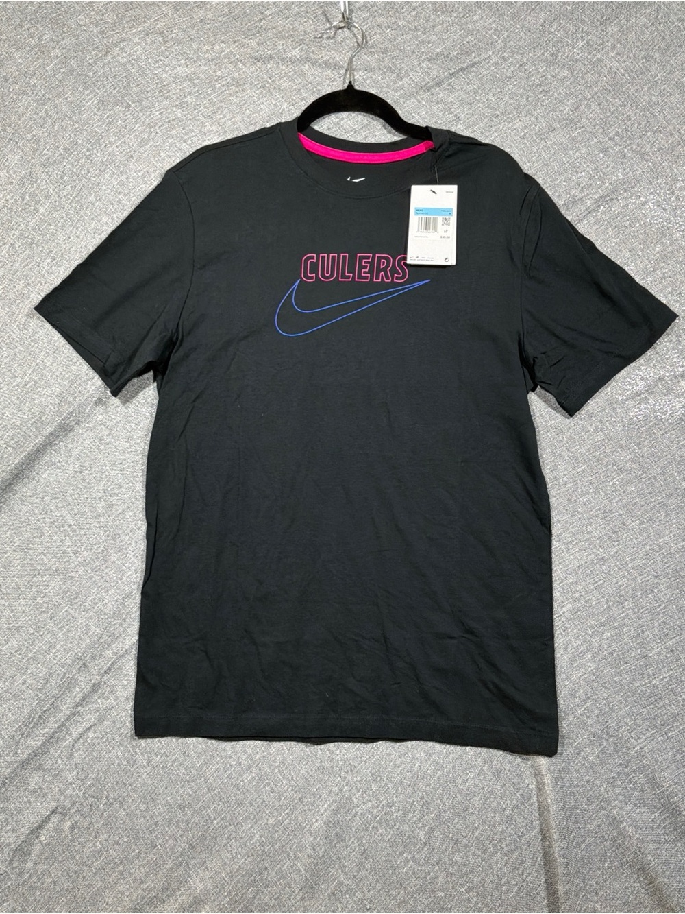 Nike Men’s Black Tee with Pink Culers Text and Blue Swoosh